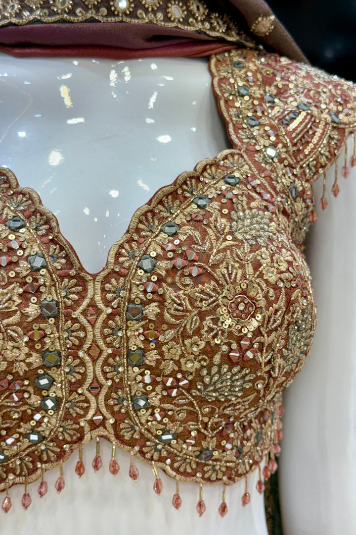 Designer Lehenga with Intricate Mirror, Stone, Sequins, Zari and Beads work