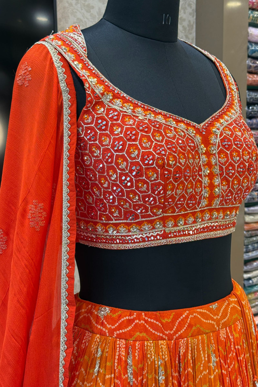 Orange Mirror, Stone, Zardozi and Sequins work with Bandini Print Crop Top Lehenga