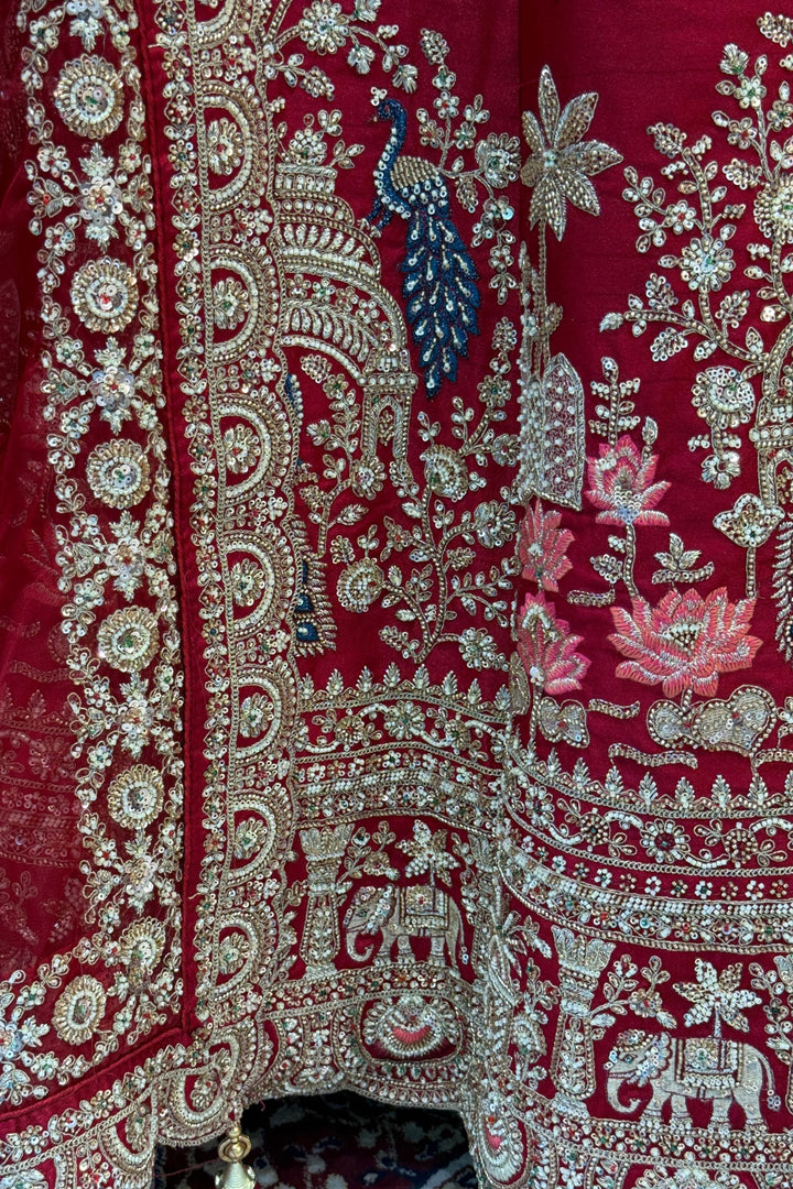 Red Beads, Sequins and Zari work Bridal Lehenga with Intricate Peacock and Elephant Motifs