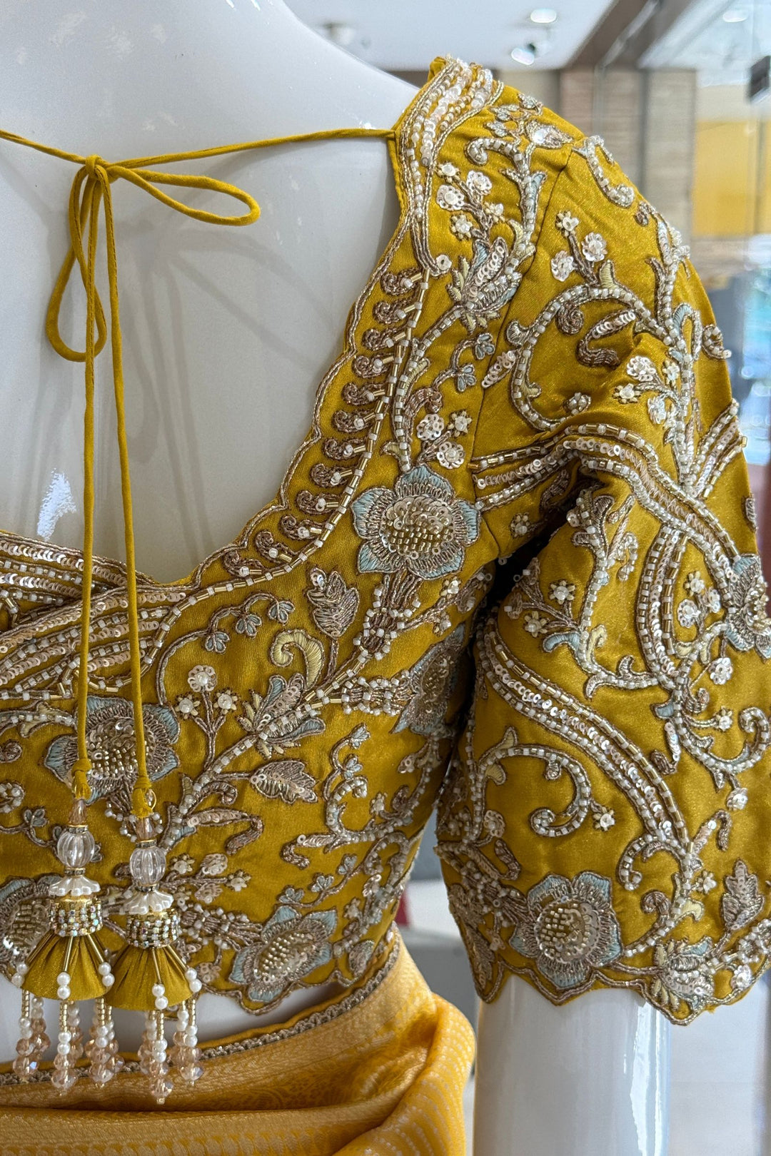Yellow Zari work Saree with Pearl, Zardozi, Beads and Sequins work Readymade Blouse