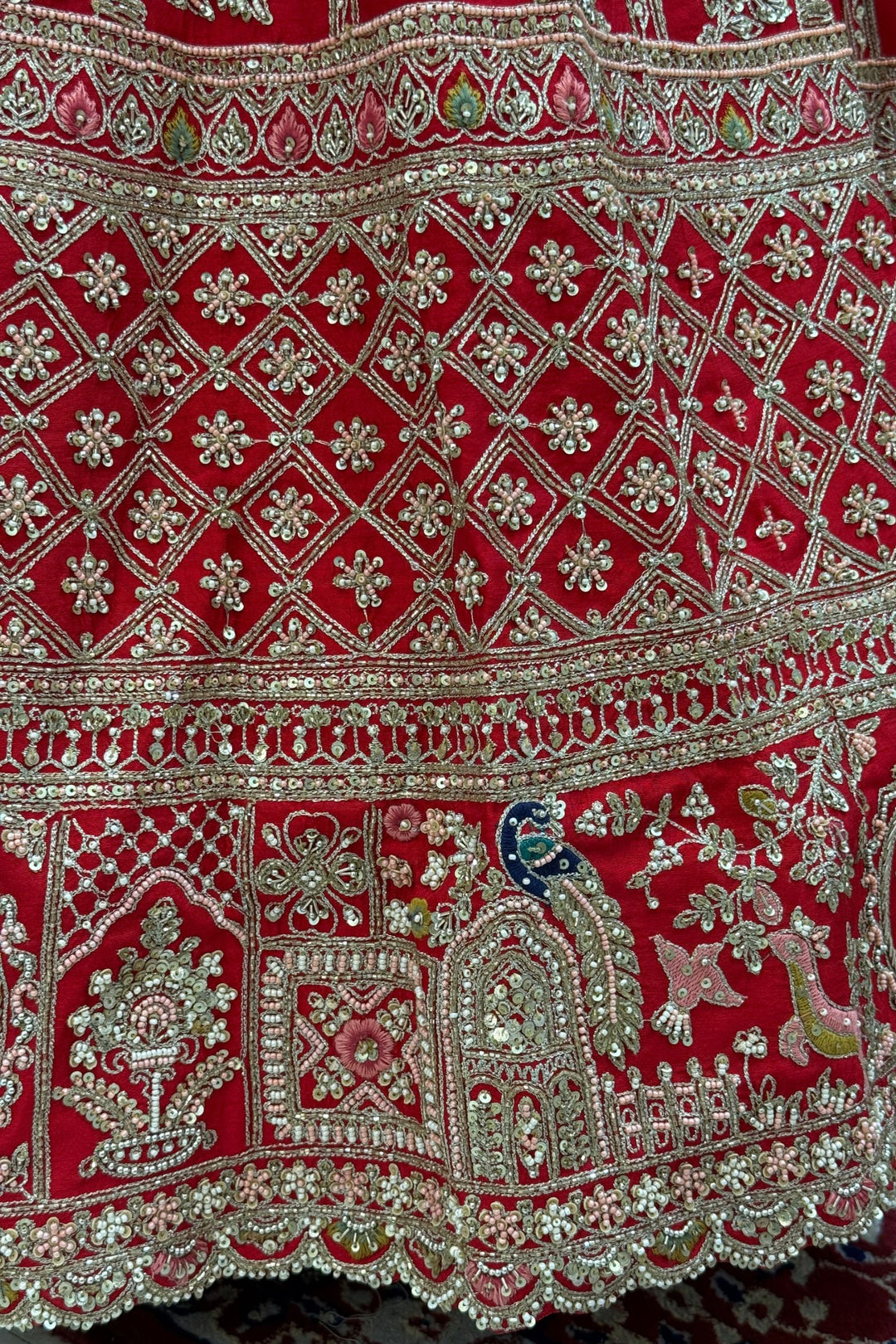 Red Handcrafted Bridal Lehenga with Intricate Zardozi, Sequins, Pearl and Zari Detailing