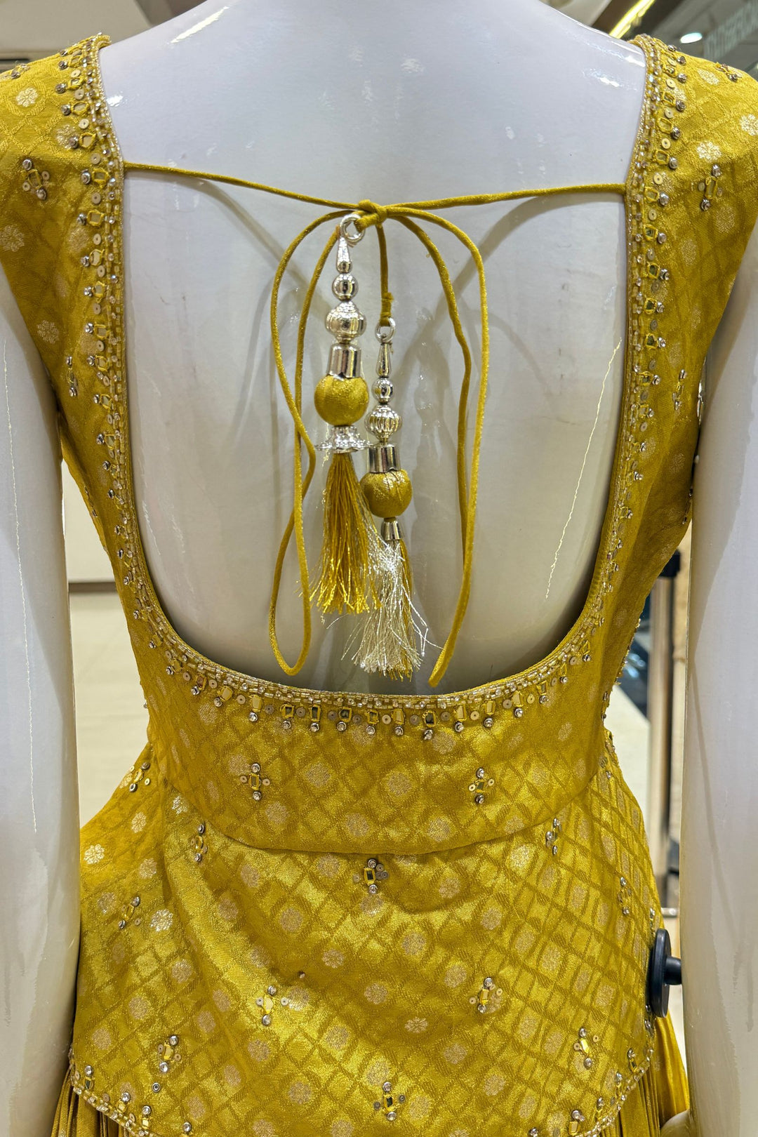 Yellow Jacquard, Mirror, Stone, Sequins, Beads and Banaras work Peplum Style Lehenga