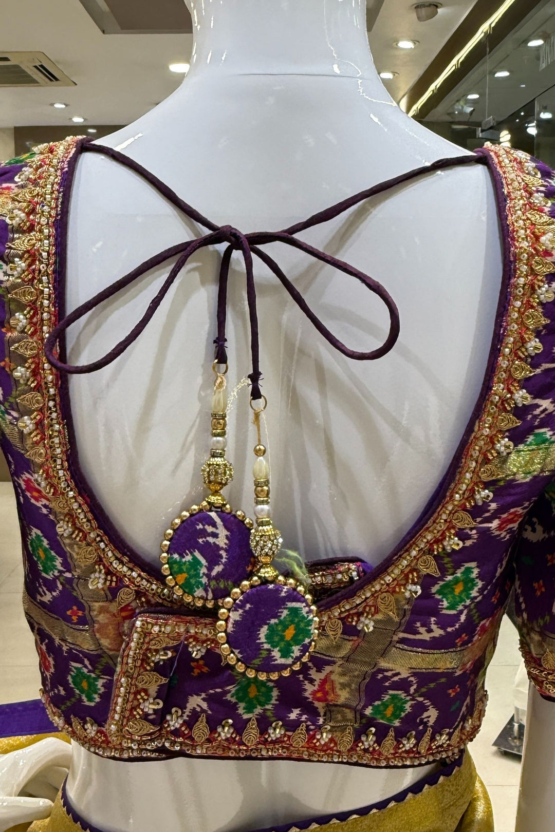 Mustard Saree with Purple Beads, Zari and Sequins work with Pochampally Print Blouse