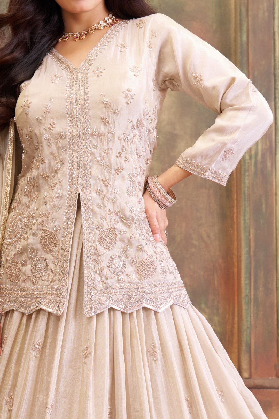 Cream Beads, Pearl and Sequins work Peplum Style Lehenga