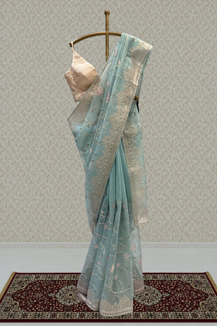 Sea Green Designer Saree with Silver Zari Border and Floral Embroidery