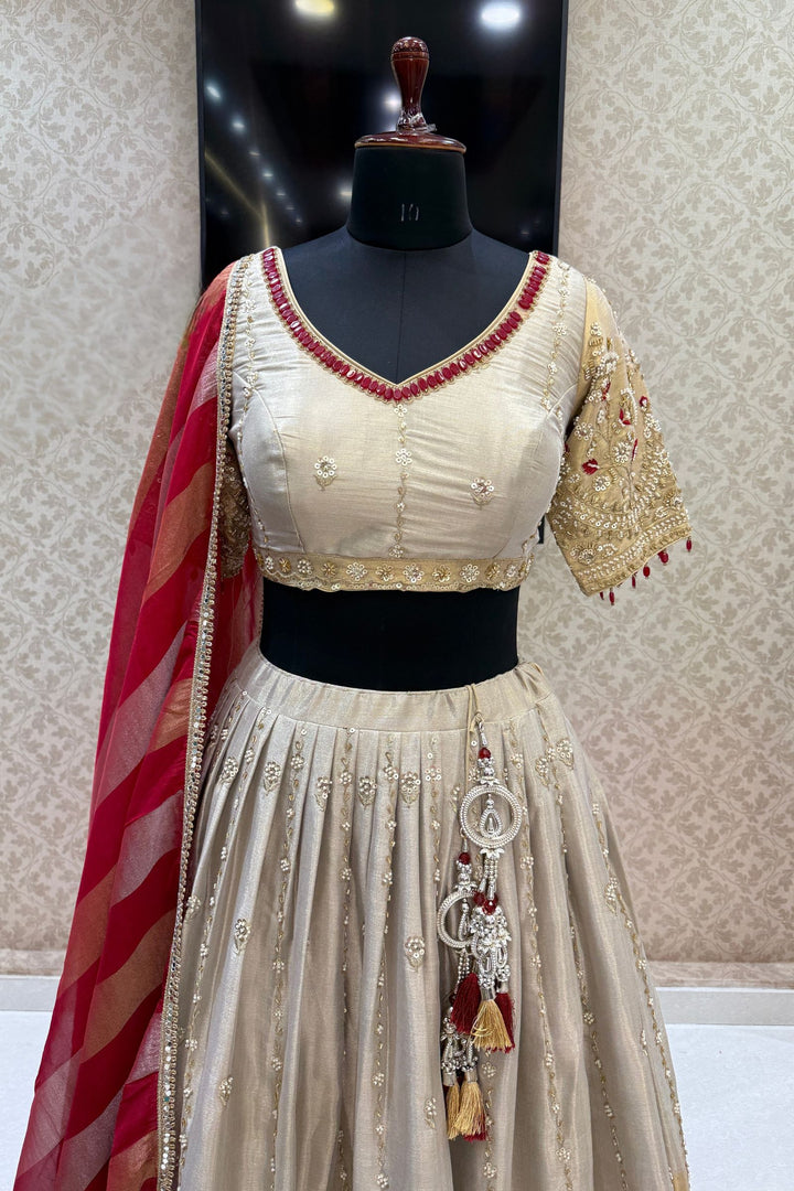 Beige and Gold Embellished Lehenga Set with Contrast Maroon Dupatta