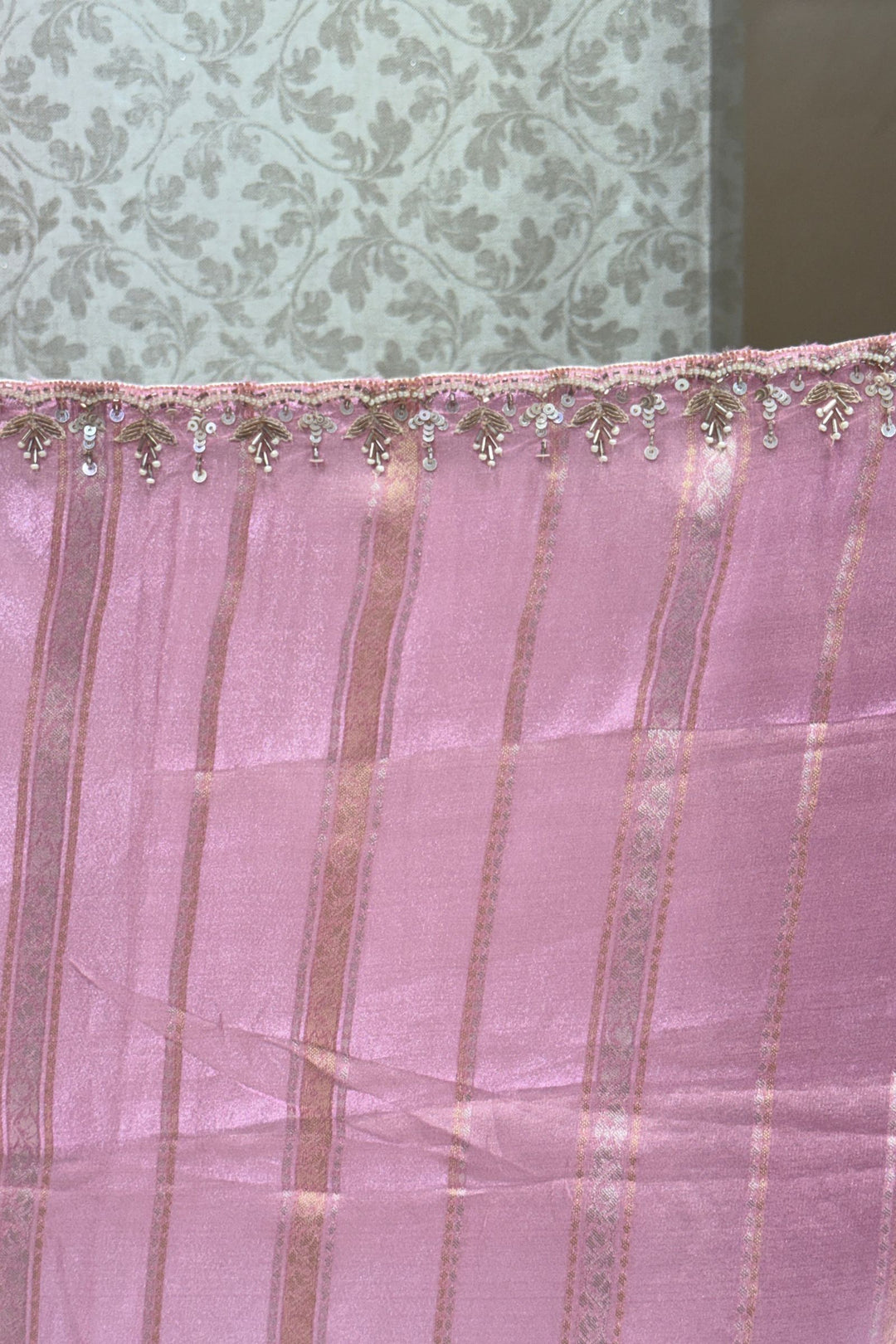 Elegant Pink and Peach Saree with Golden Zari Stripe Detailing