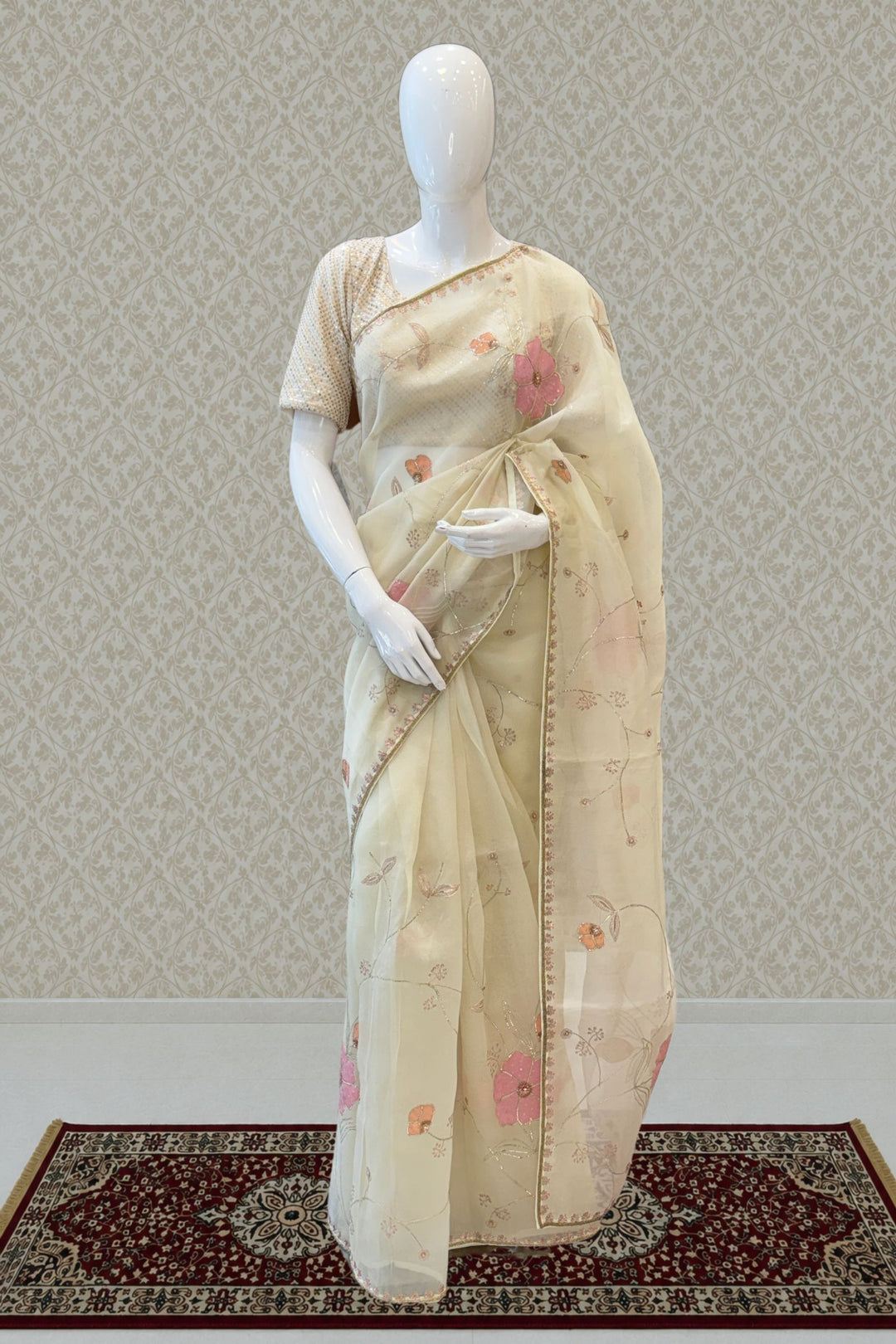 Elegant Cream Organza Saree with Pink Handcrafted Floral Applique