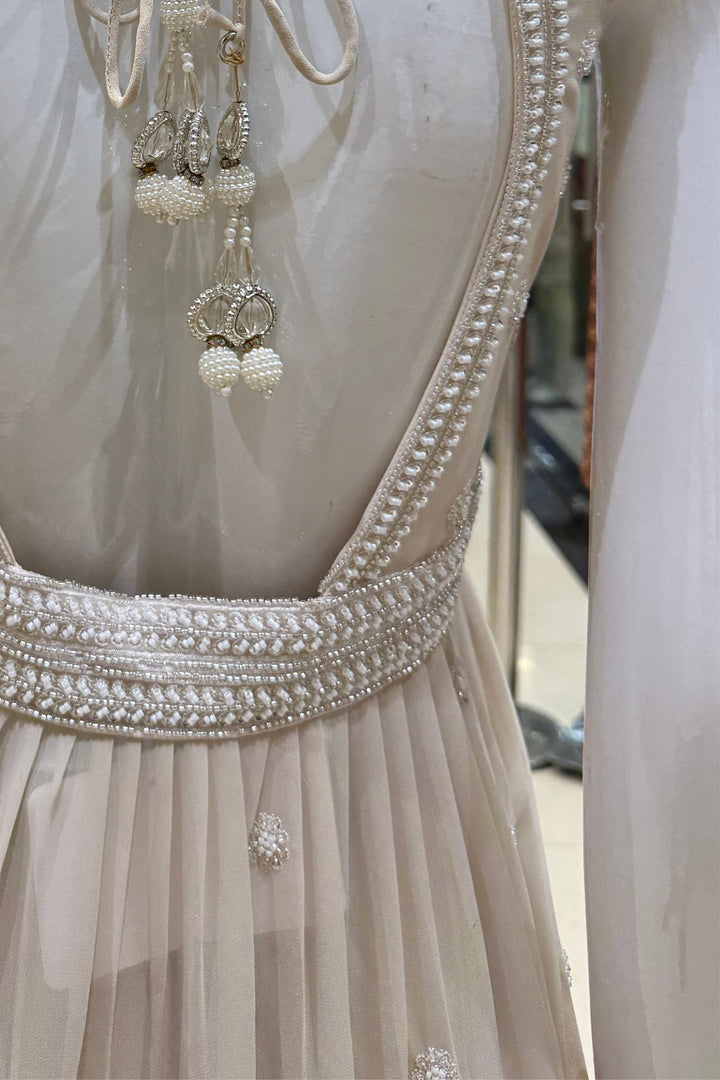 Beige Beads, Sequins and Thread work Peplum Top with Sharara Suit Set