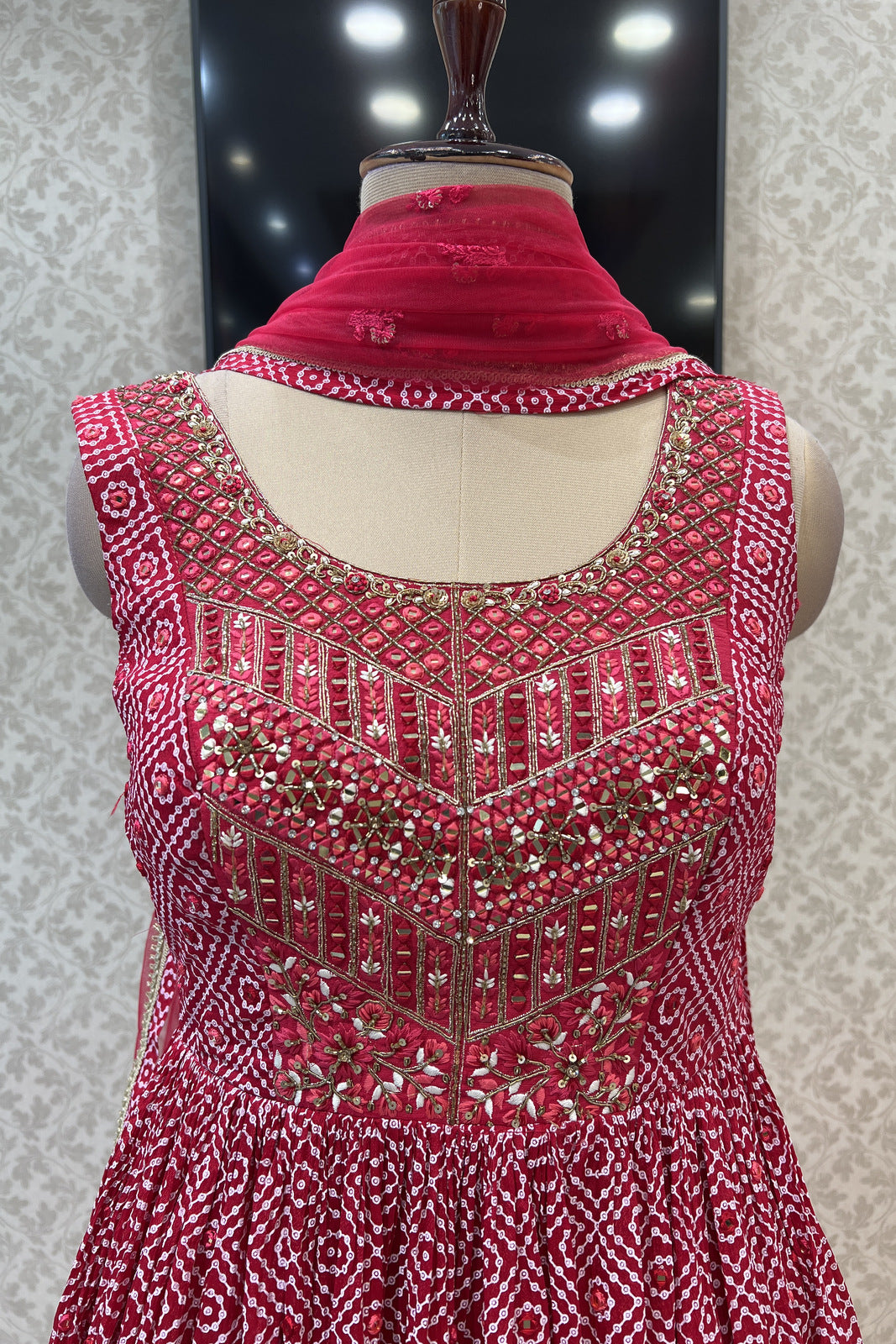 Red Printed, Mirror, Stone and Thread work Peplum Style Lehenga