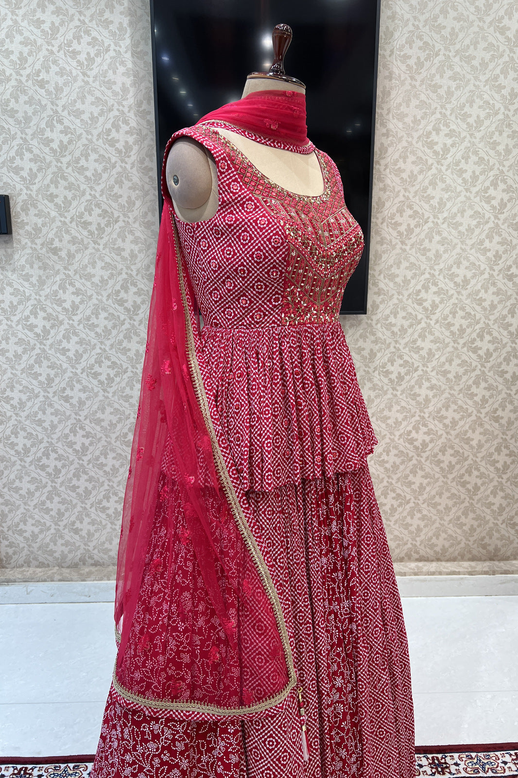 Red Printed, Mirror, Stone and Thread work Peplum Style Lehenga