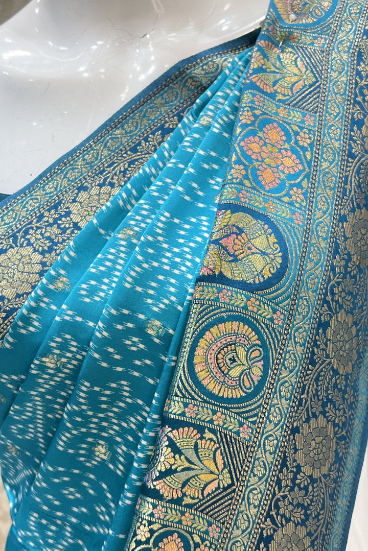 Rama Blue Banaras work and Bandini Print Saree