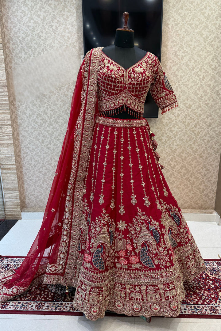 Red Beads, Sequins and Zari work Bridal Lehenga with Intricate Peacock and Elephant Motifs