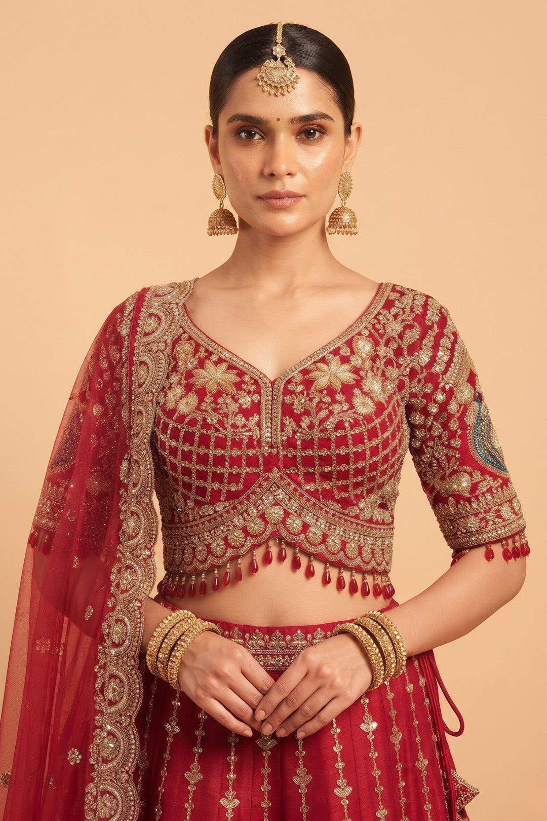 Red Beads, Sequins and Zari work Bridal Lehenga with Intricate Peacock and Elephant Motifs