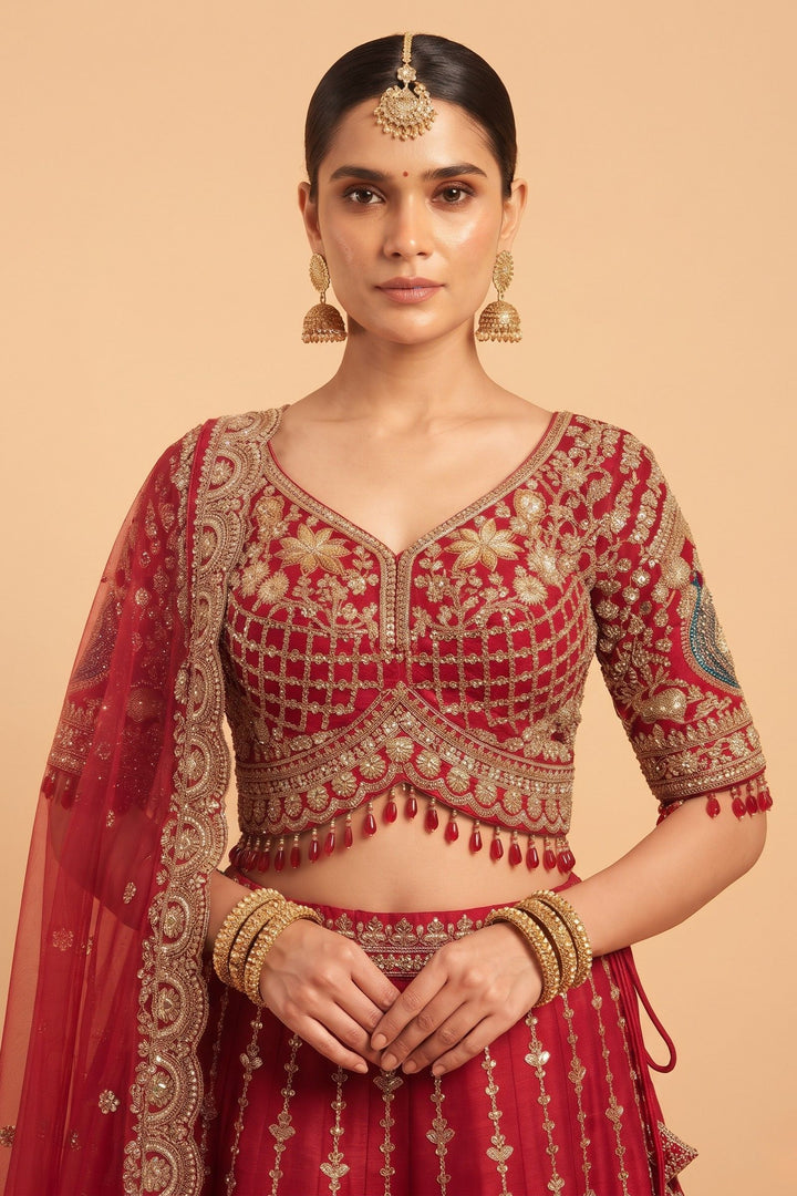 Red Beads, Sequins and Zari work Bridal Lehenga with Intricate Peacock and Elephant Motifs
