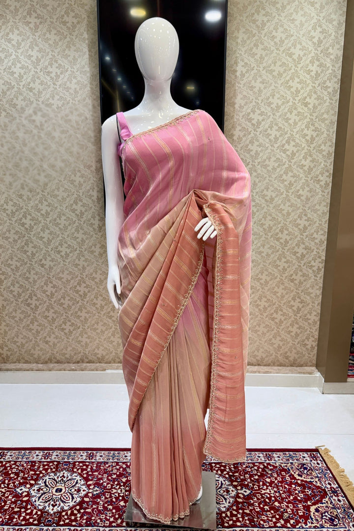 Elegant Pink and Peach Saree with Golden Zari Stripe Detailing