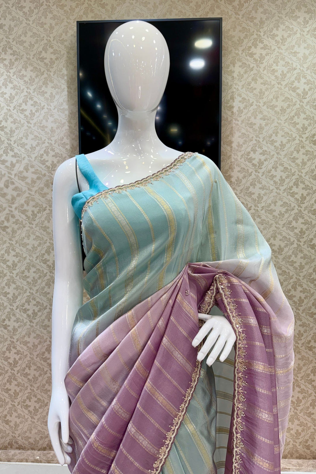 Elegant Lavender and Blue Saree with Golden Zari Stripe Detailing