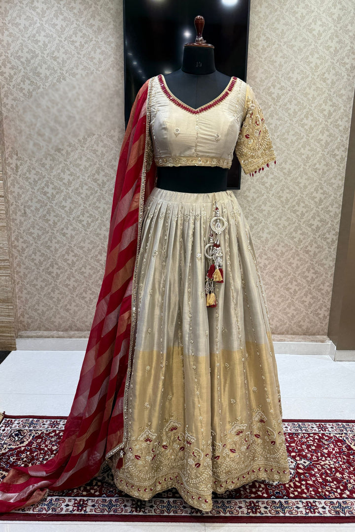 Beige and Gold Embellished Lehenga Set with Contrast Maroon Dupatta