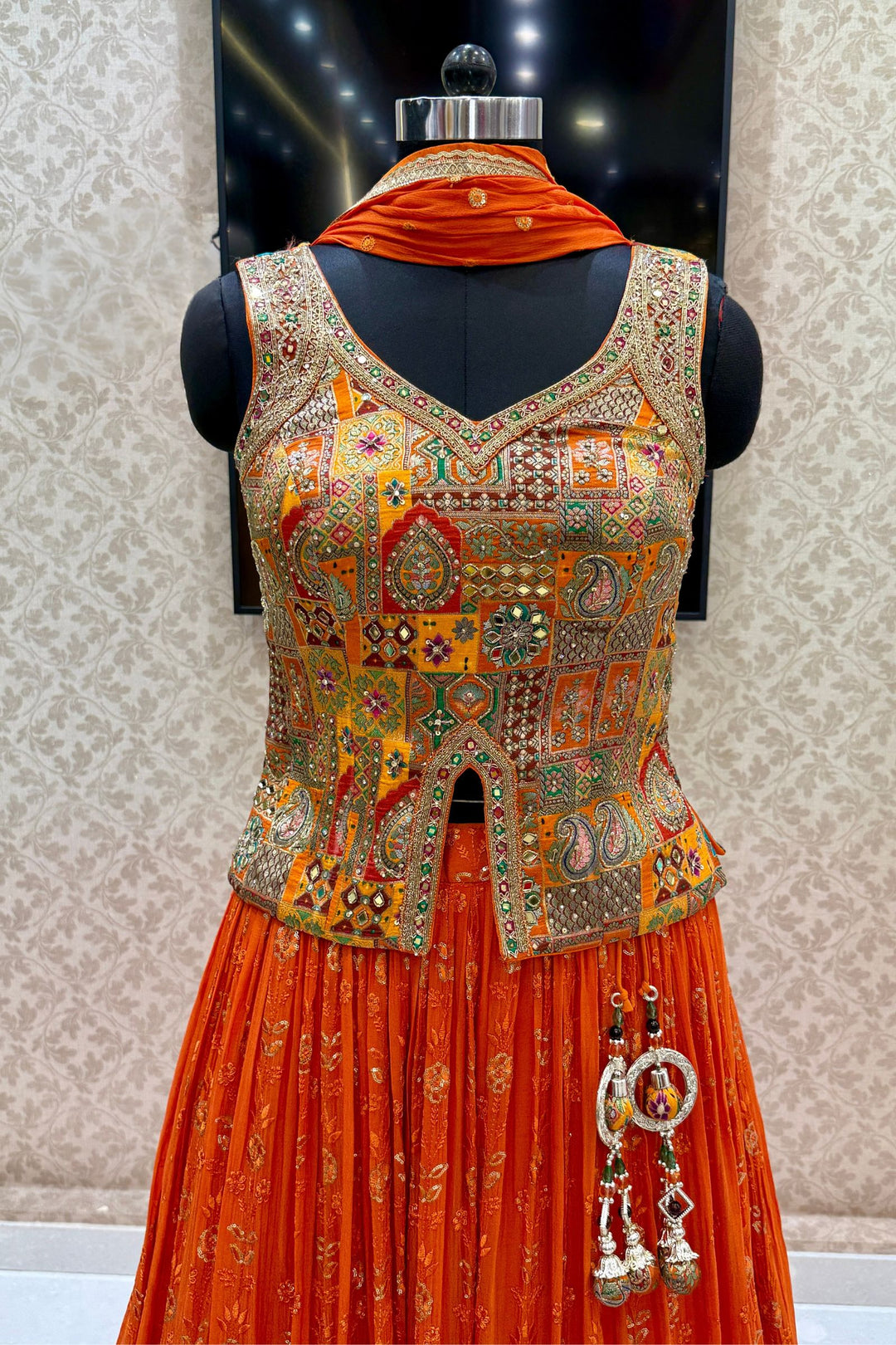 Orange Zardozi, Beads, Mirror, Stone, Zari and Beads work Peplum Style Lehenga