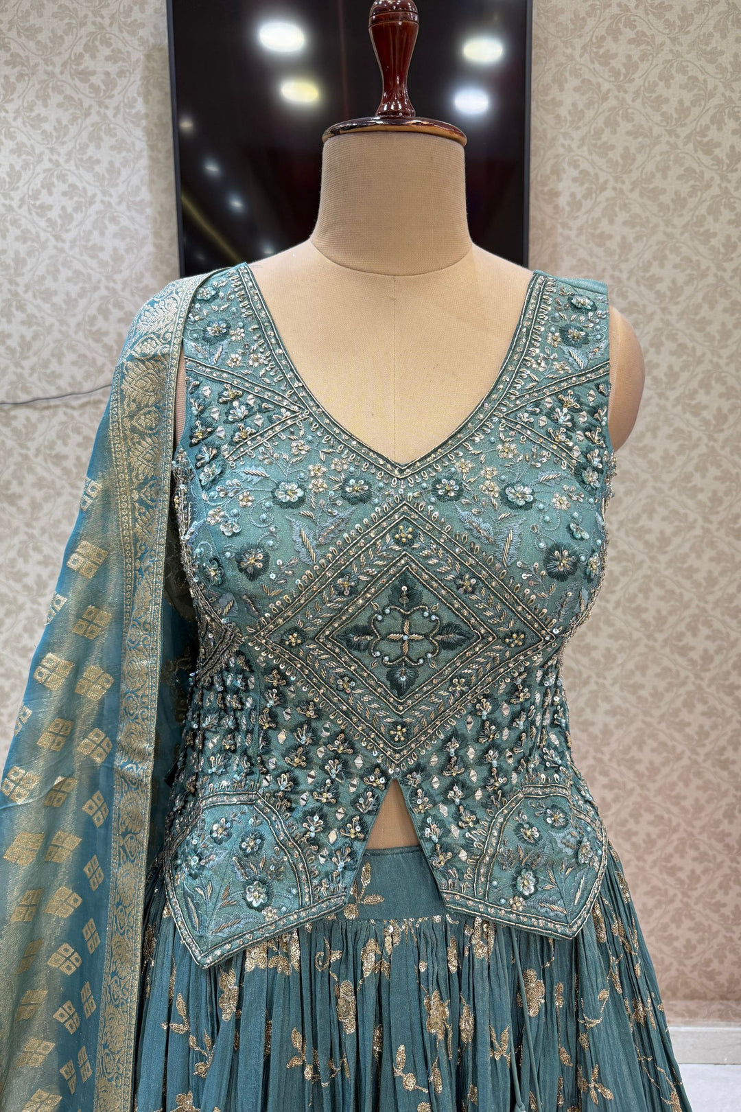 Teal Green Mirror, Zardozi, Sequins, Beads, Stone and Banaras work Peplum Style Lehenga