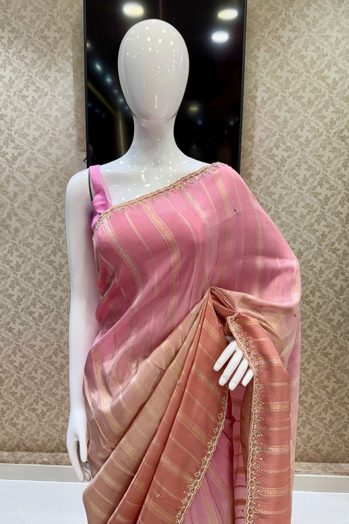 Elegant Pink and Peach Saree with Golden Zari Stripe Detailing