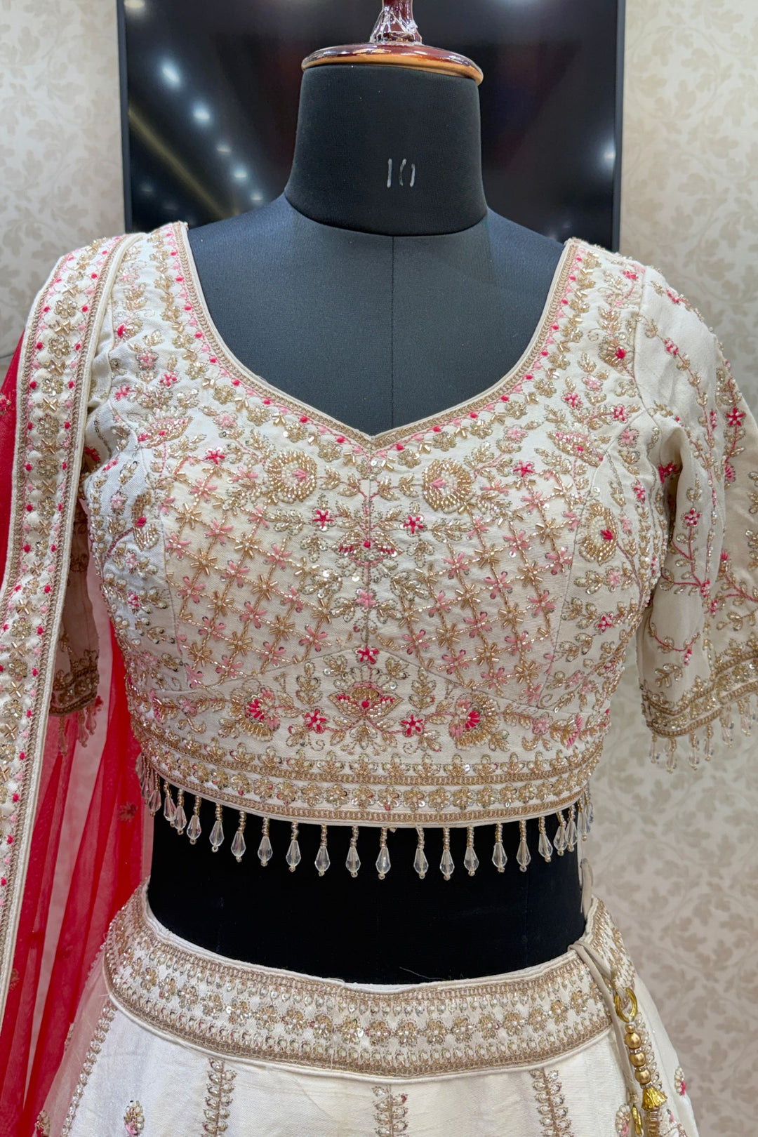 Designer Wedding Lehenga in Cream with Beads, Zari, Sequins and Thread Work