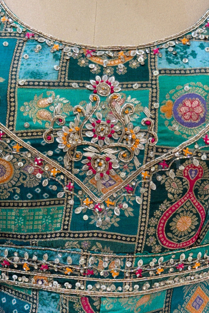 Green with Cream Banaras, Beads, Sequins, Zari and Stone work Peplum Style Lehenga