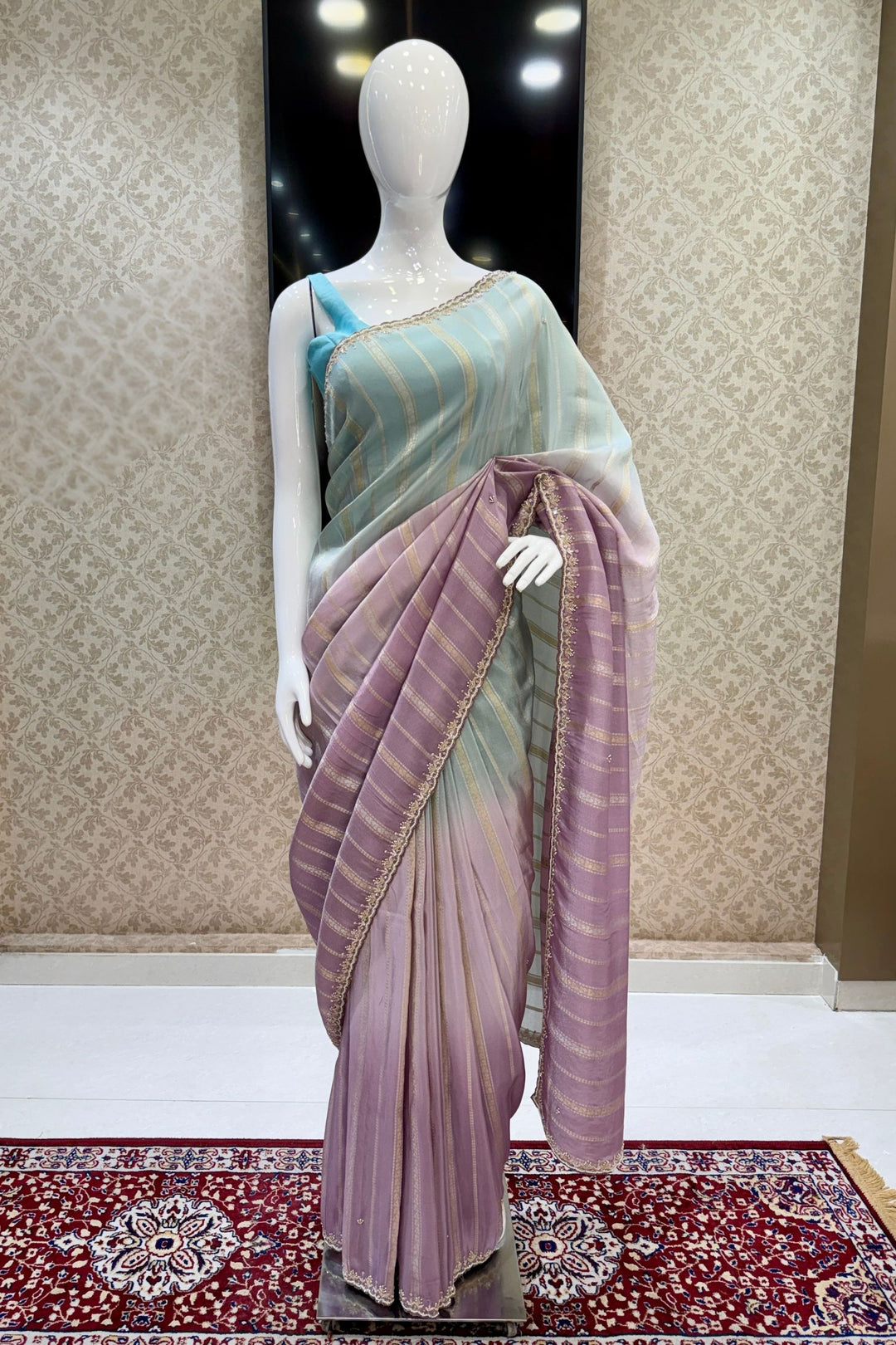 Elegant Lavender and Blue Saree with Golden Zari Stripe Detailing