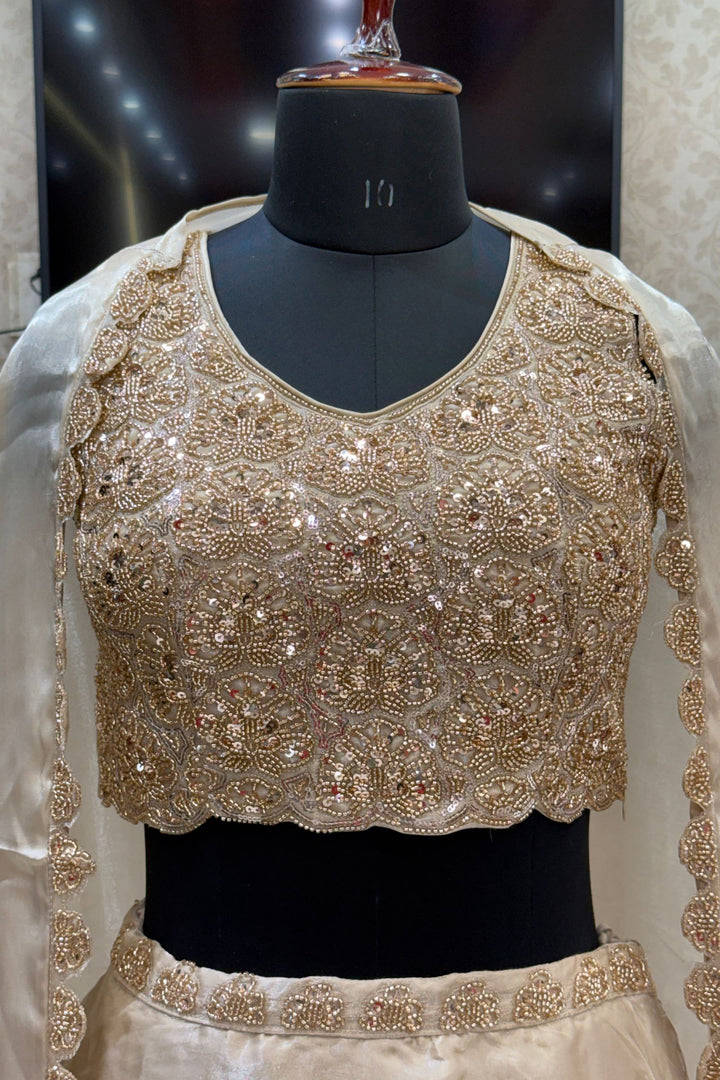 Gold Sequins and Beads work Choli with Lehenga and Draped Cape