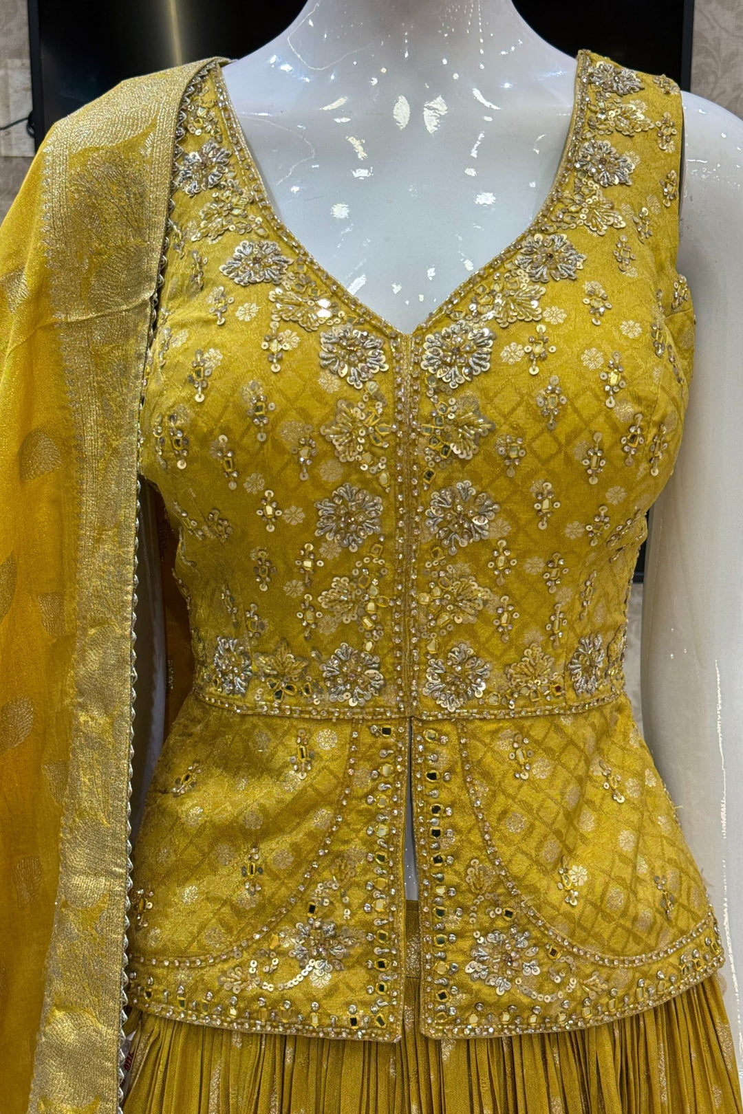 Yellow Jacquard, Mirror, Stone, Sequins, Beads and Banaras work Peplum Style Lehenga