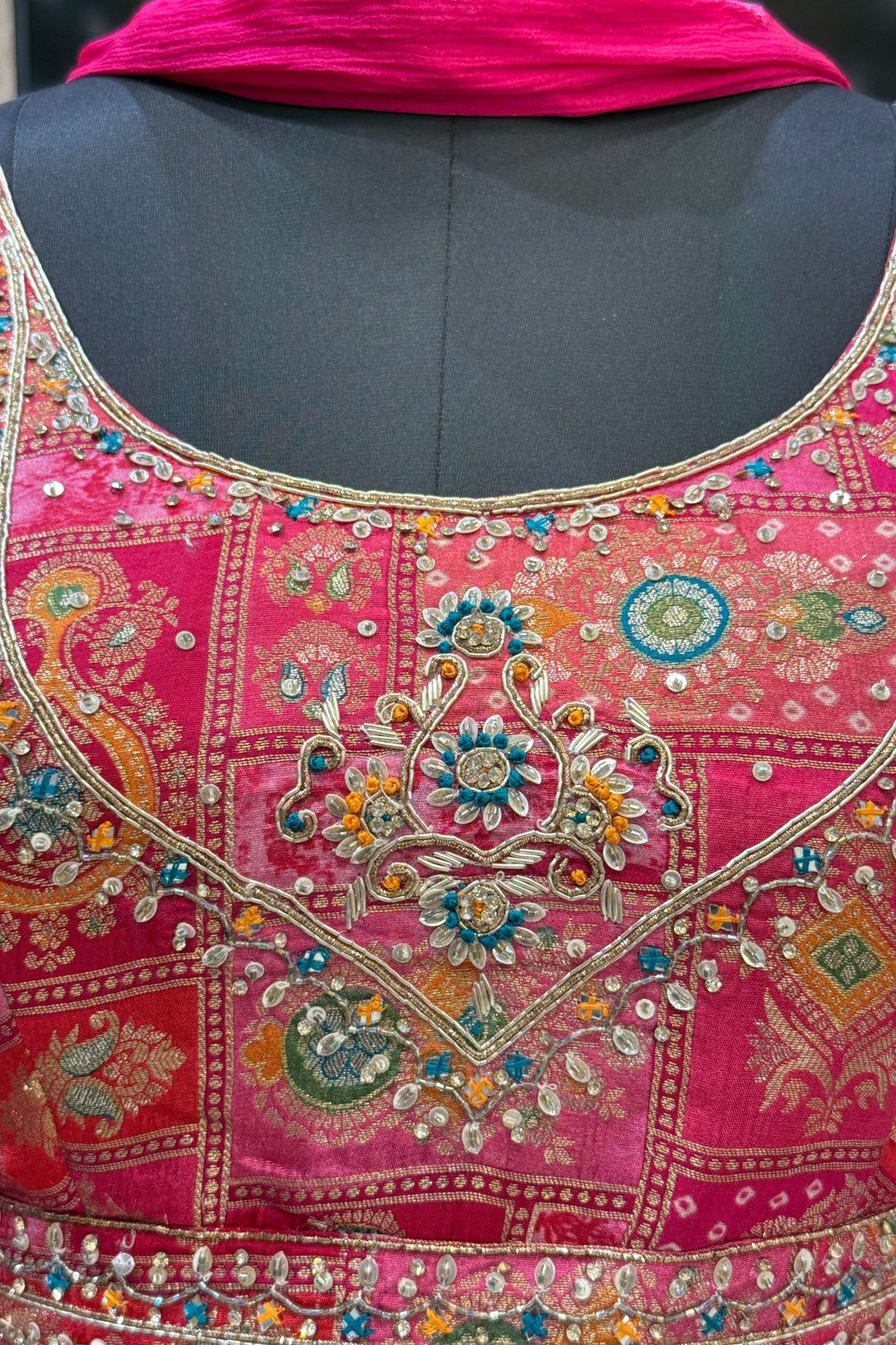 Rani Pink with Cream Banaras, Beads, Sequins, Zari and Stone work Peplum Style Lehenga