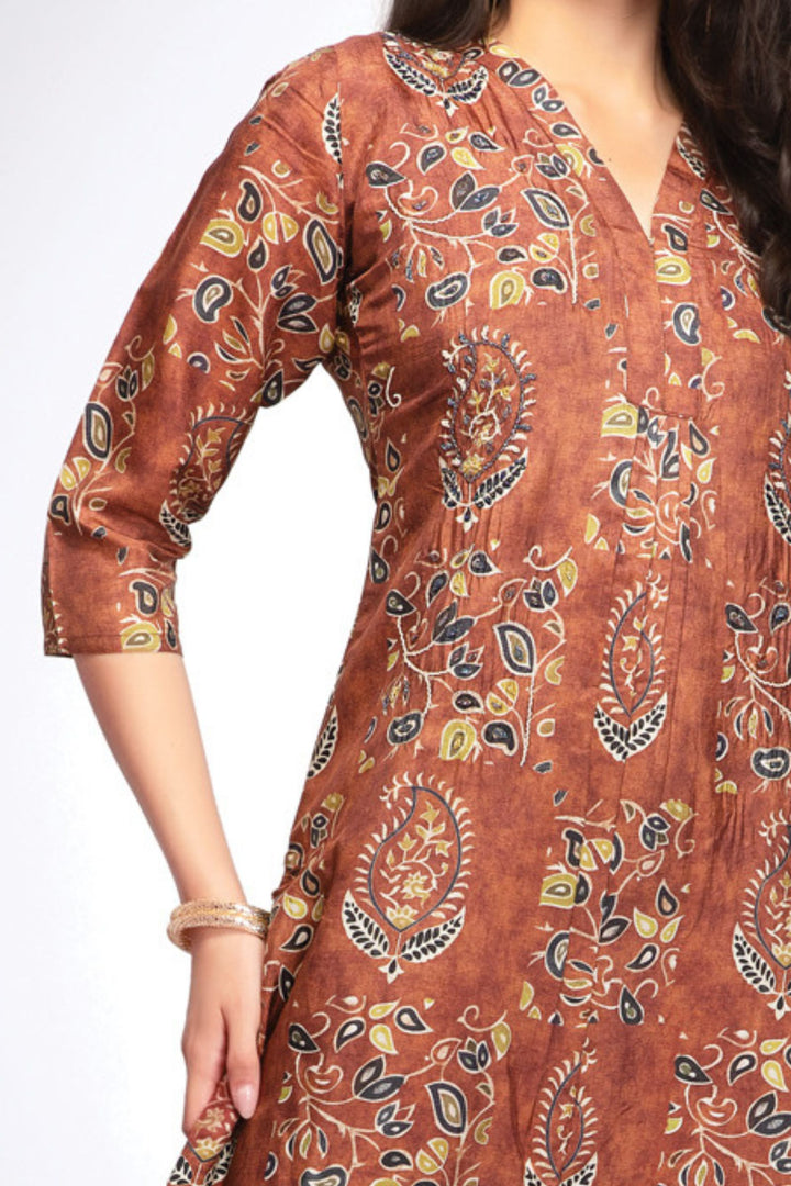 Rust Beads and Zari work with Digital Print Calf Length Kurti