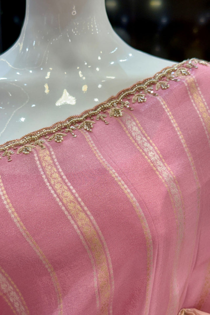 Elegant Pink and Peach Saree with Golden Zari Stripe Detailing