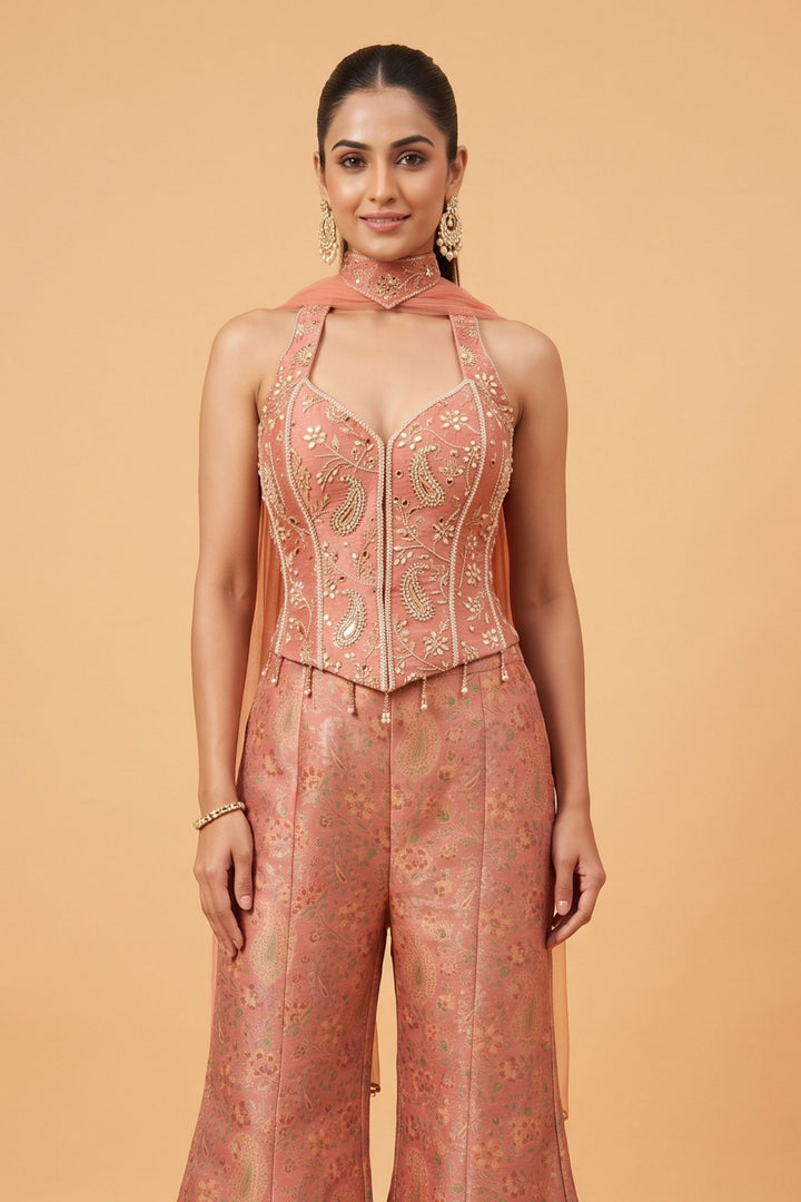 Peach Halter Neck Palazzo Salwar Suit with Multicolor Brocade and Sequins Detailing