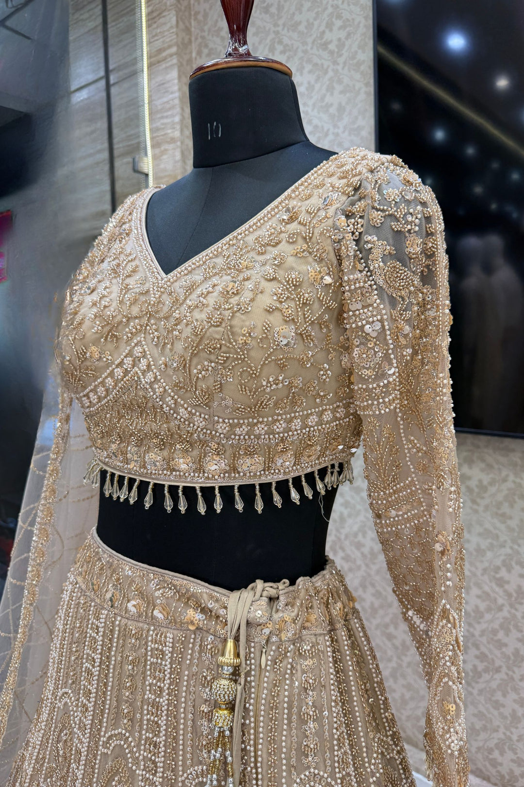 Beige Sequins, Pearl and Zari work Flared Lehenga Set with Peacock Motifs