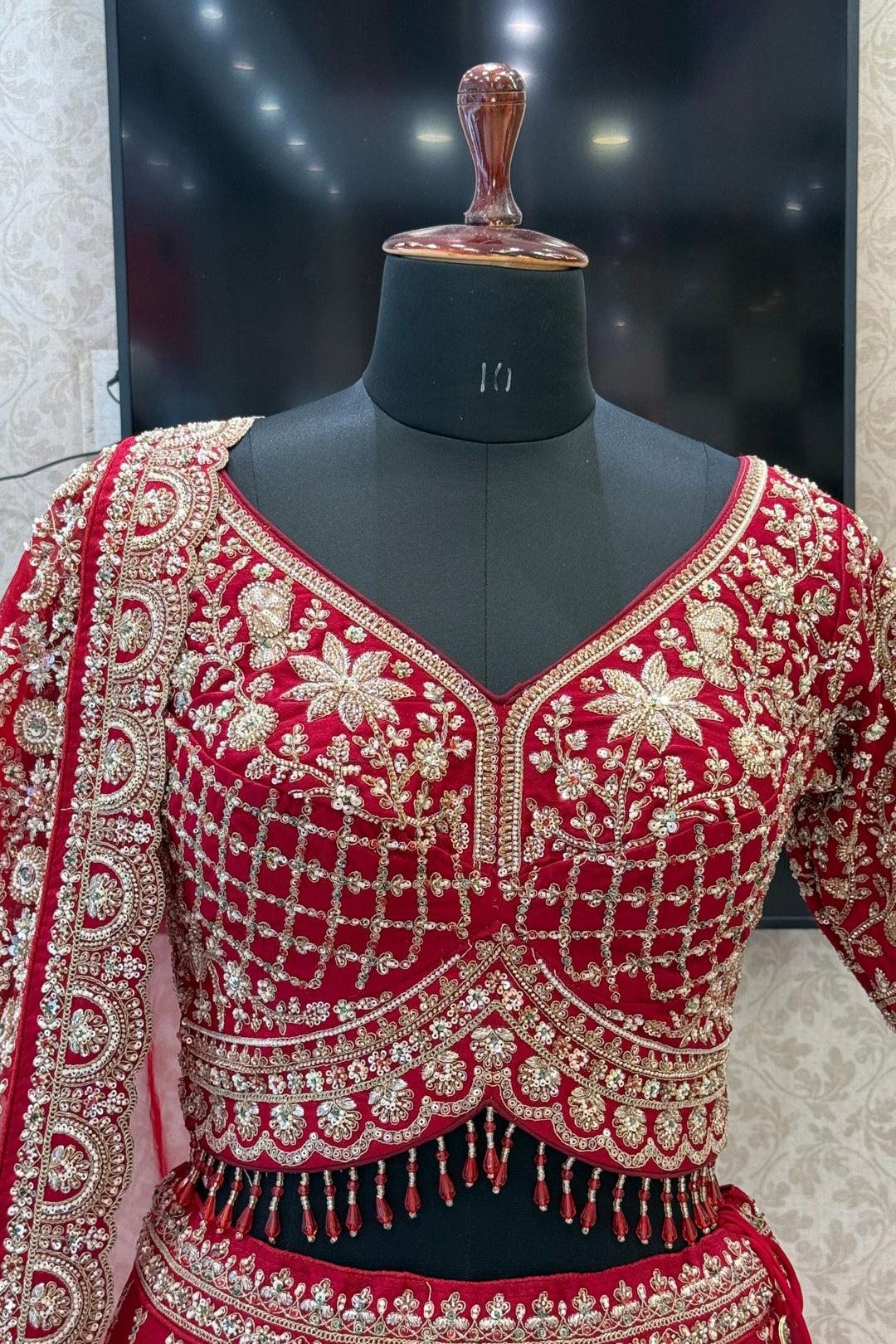 Red Beads, Sequins and Zari work Bridal Lehenga with Intricate Peacock and Elephant Motifs
