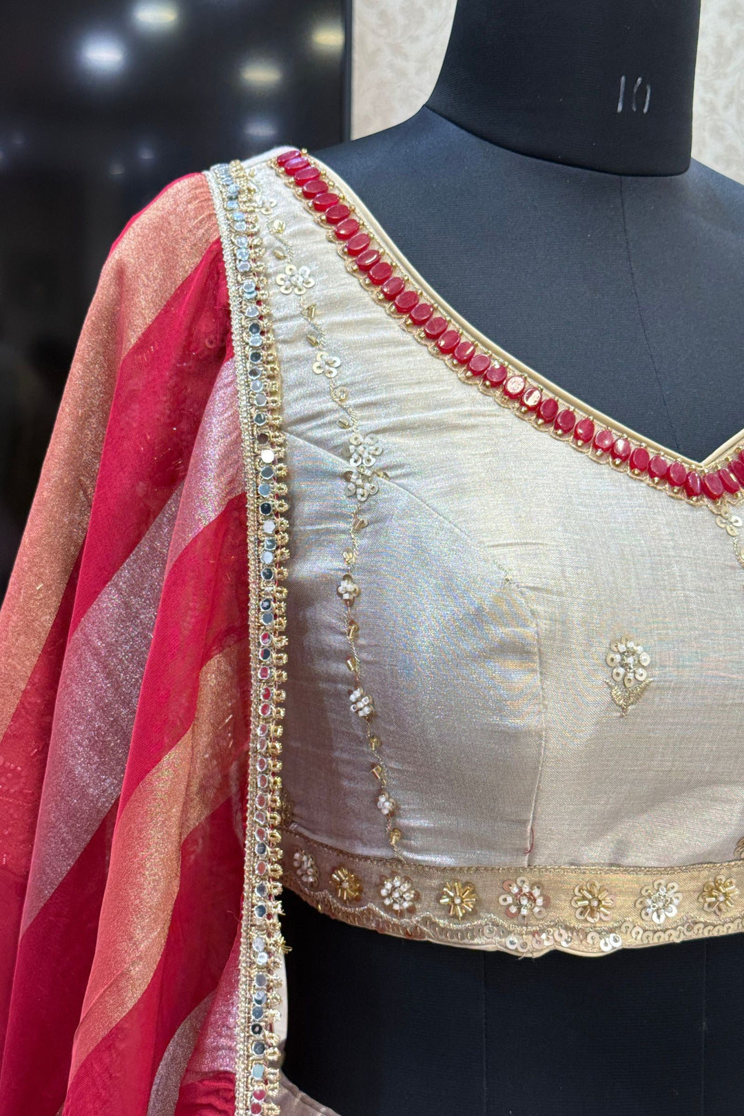 Beige and Gold Embellished Lehenga Set with Contrast Maroon Dupatta