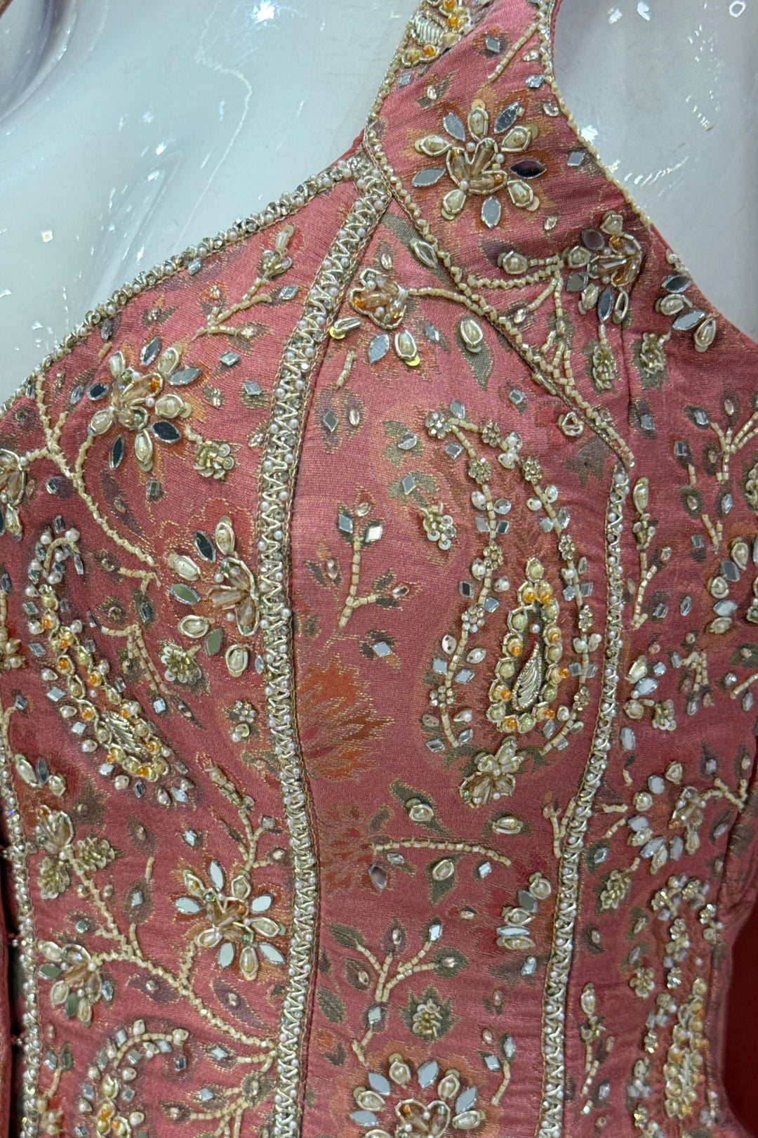 Peach Halter Neck Palazzo Salwar Suit with Multicolor Brocade and Sequins Detailing