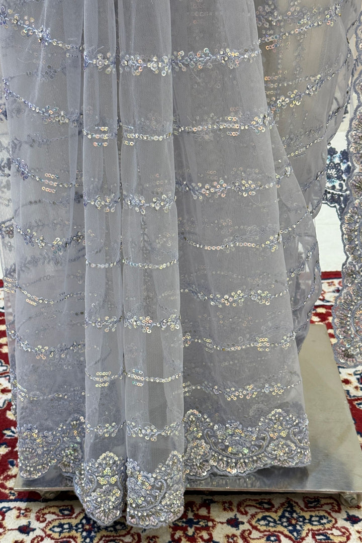 Premium Party Wear Net Saree with Heavy Embellished Border