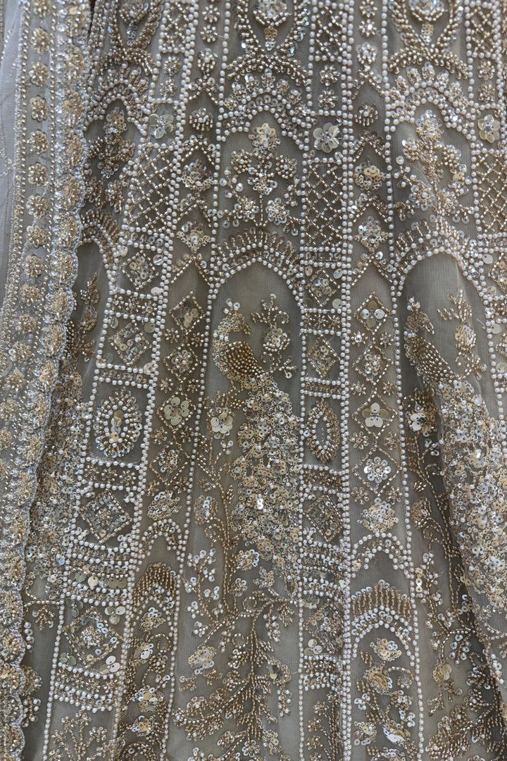 Beige Sequins, Pearl and Zari work Flared Lehenga Set with Peacock Motifs