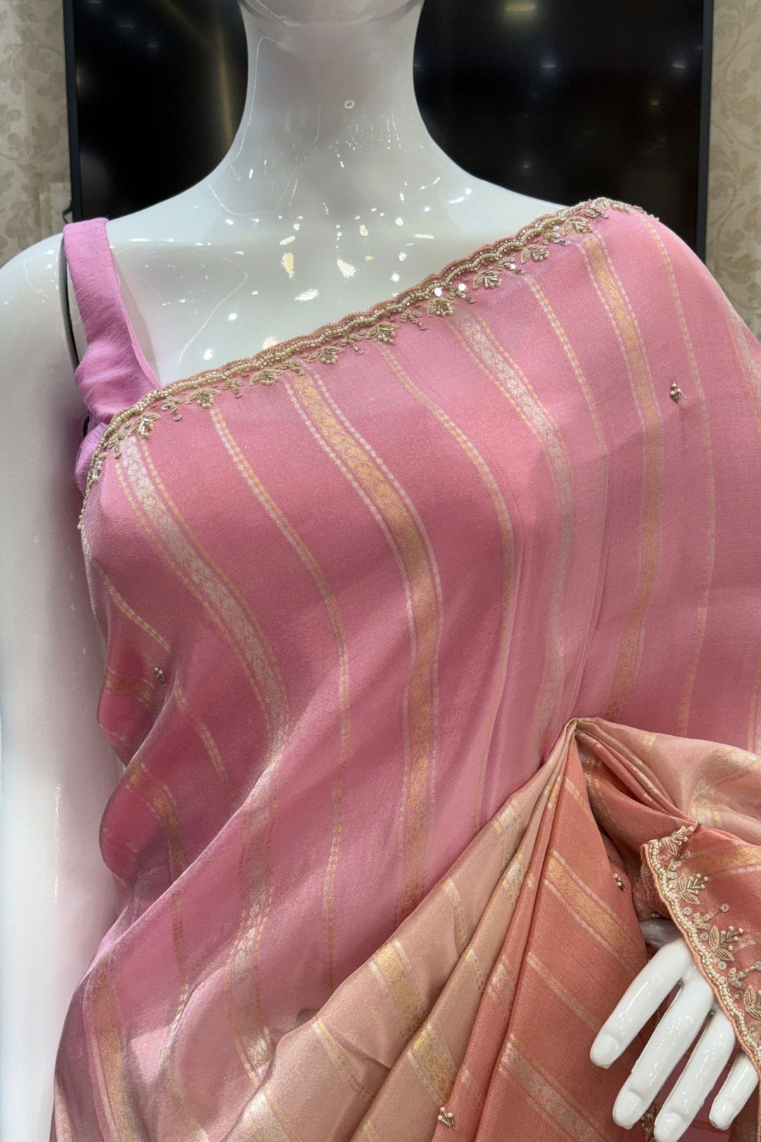 Elegant Pink and Peach Saree with Golden Zari Stripe Detailing