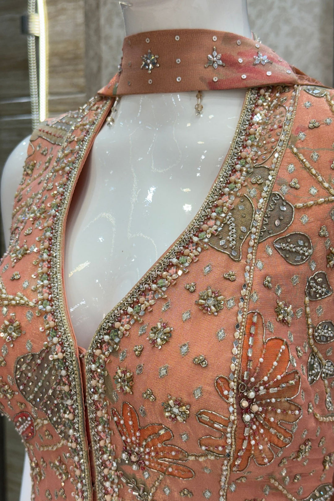 Peach Indo-Western Styled Halter Neck Top and Cowl Skirt