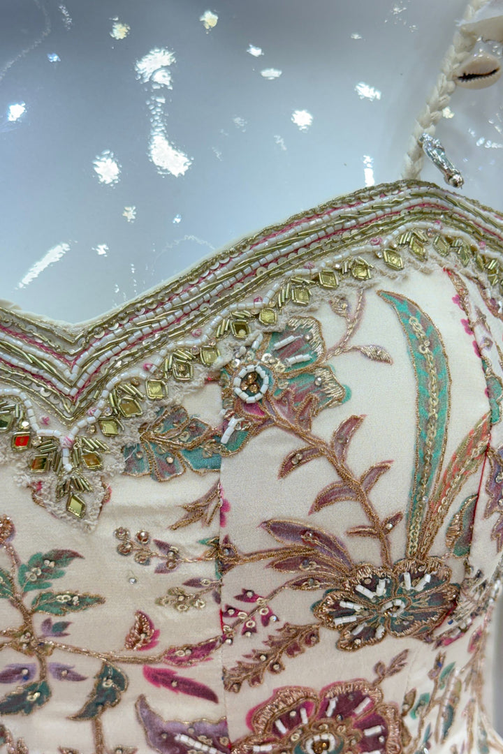 Cream Floral Print Peplum Top and Flared Palazzo Set with Zari and Beads work