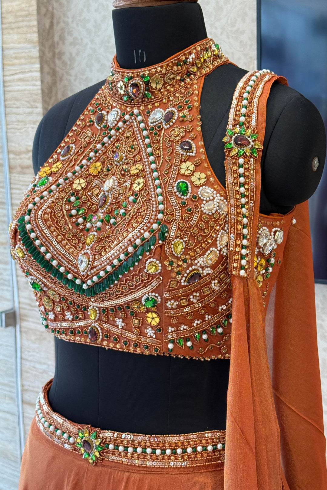 Rust Beads, Zardozi, Stone, Sequins and Pearl work with Halter Neck Crop Top Lehenga
