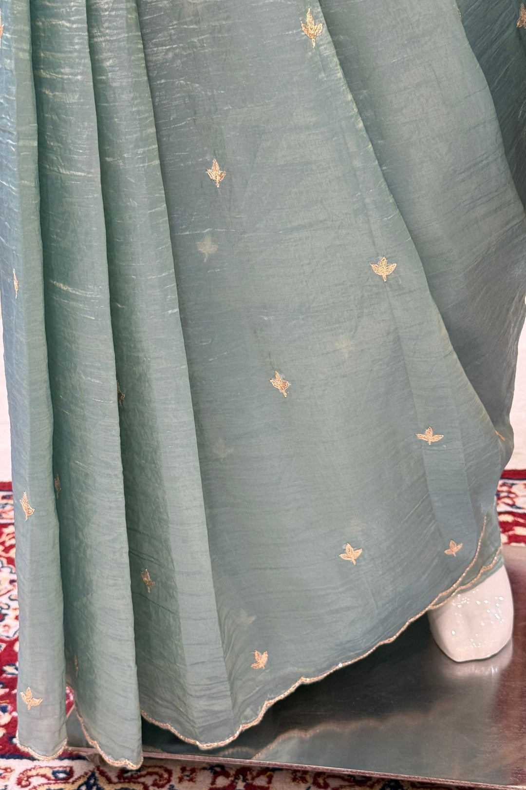 Sea Green Shimmer Tissue Saree with Scalloped Zari Border