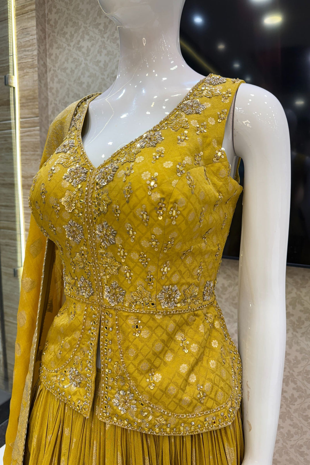Yellow Jacquard, Mirror, Stone, Sequins, Beads and Banaras work Peplum Style Lehenga