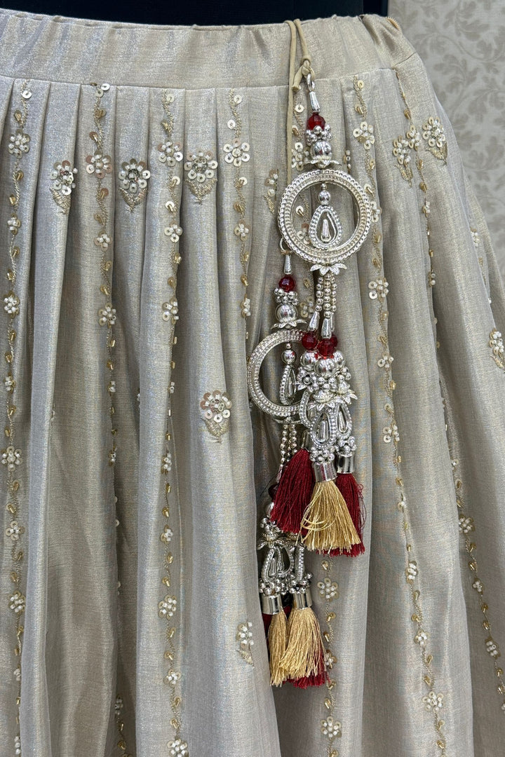 Beige and Gold Embellished Lehenga Set with Contrast Maroon Dupatta