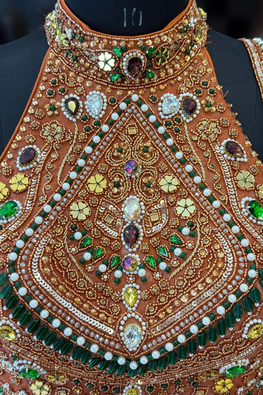 Rust Beads, Zardozi, Stone, Sequins and Pearl work with Halter Neck Crop Top Lehenga