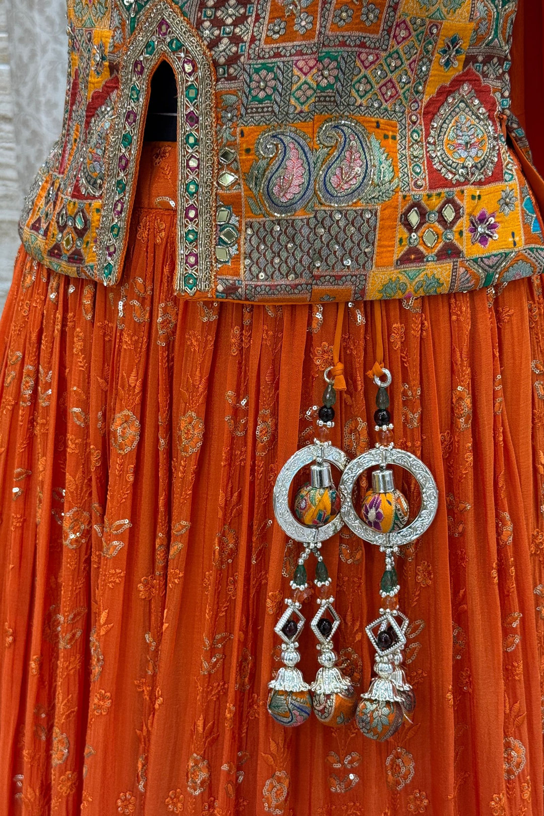 Orange Zardozi, Beads, Mirror, Stone, Zari and Beads work Peplum Style Lehenga