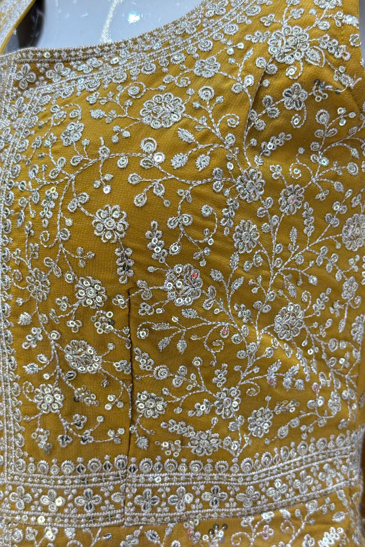 Mustard Silver Zari and Sequins work Peplum Top with Palazzo Suit Set